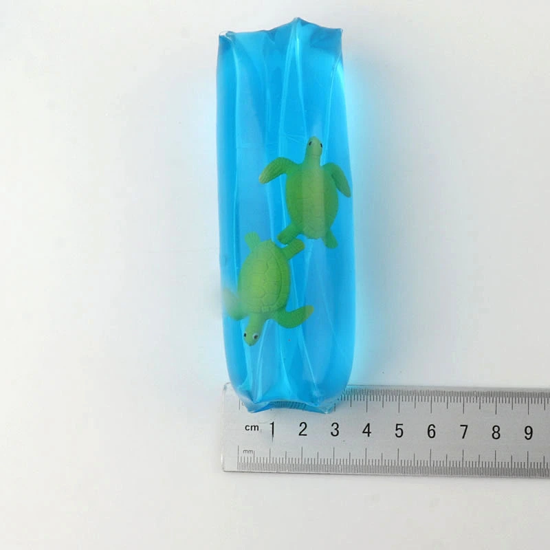 Filling sea animals inside water snake toy